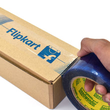Roll of blue tape with Flipkart lSatkarn Kabir Venture for shipping purposes.